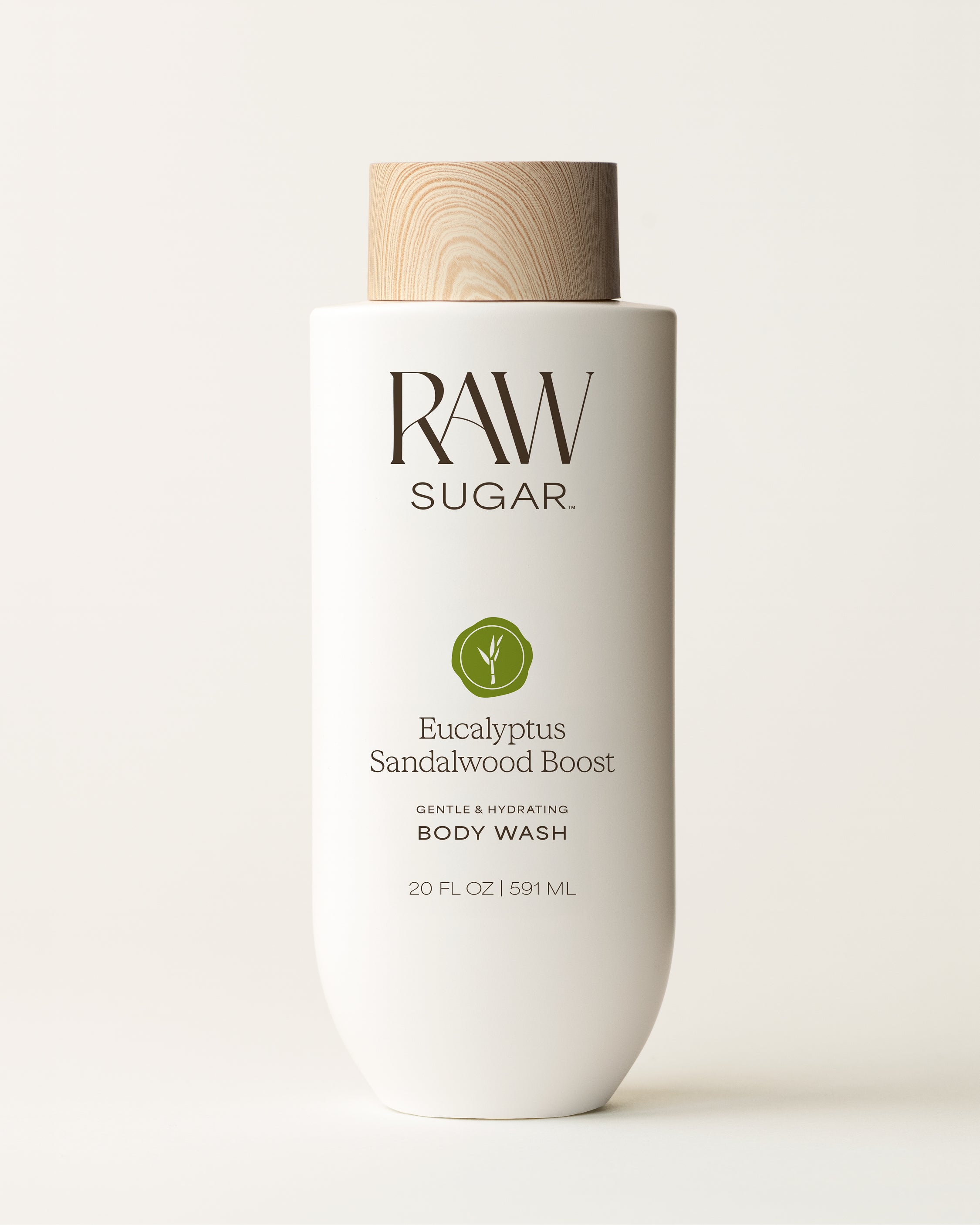 RAW Sugar body wash bottle with wooden cap on a white background